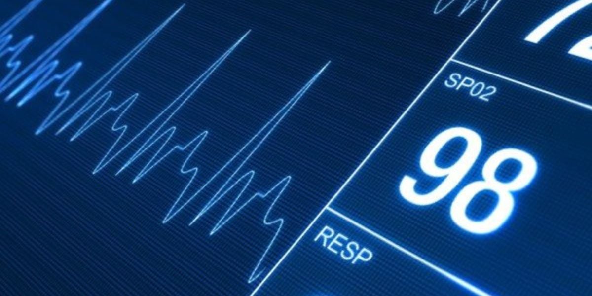 SpO2-Monitor Anzeige – digitale Kurve und Sauerstoffsättigung 98 Prozent auf medizinischem Überwachungsbildschirm