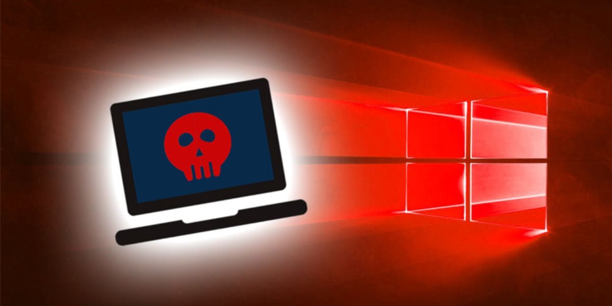 Rot leuchtendes Microsoft Logo & ein Laptop mit einem Totenkopf im Bildschirm
